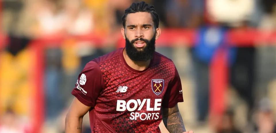 Player in West Ham United jersey on the field