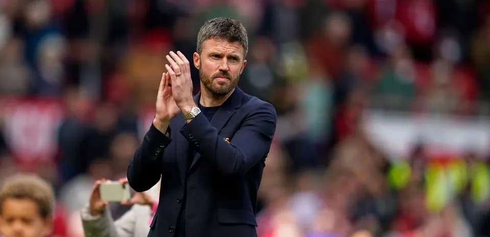 Manager applauding fans during post-match appreciation