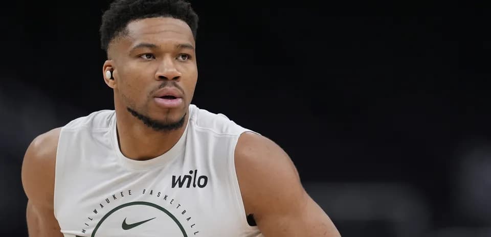 Player in Milwaukee Bucks gear during warm-up
