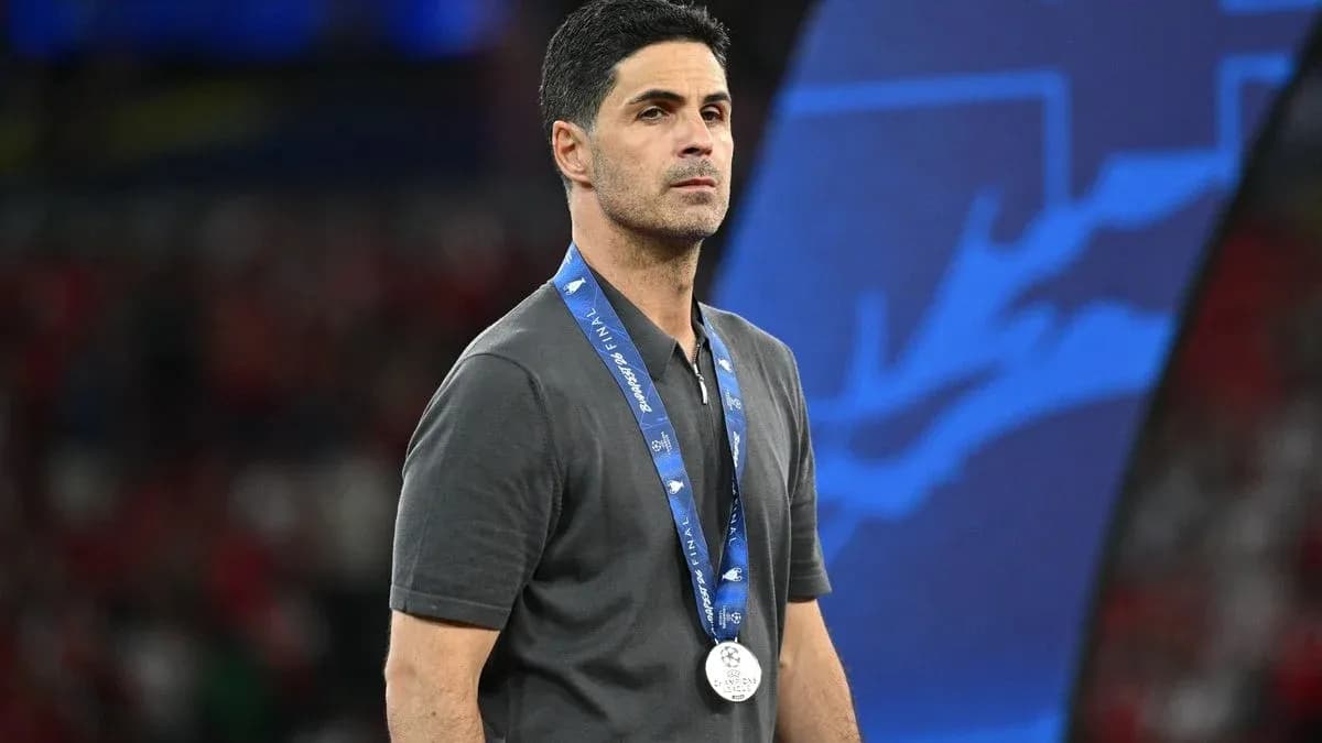 Manager wearing silver medal after match
