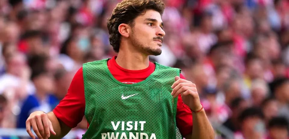 Player warming up on the sidelines during match