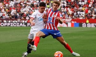 Sevilla player challenges Atletico Madrid opponent