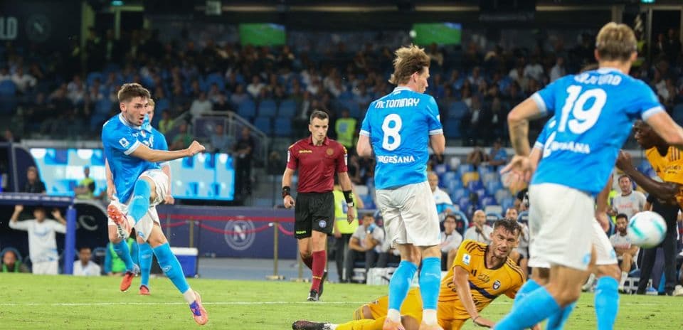 Napoli player striking the ball in match