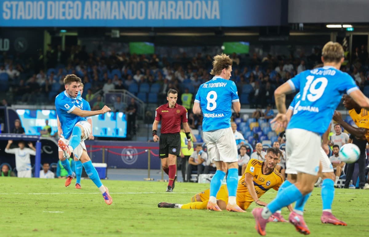Napoli player striking the ball in match
