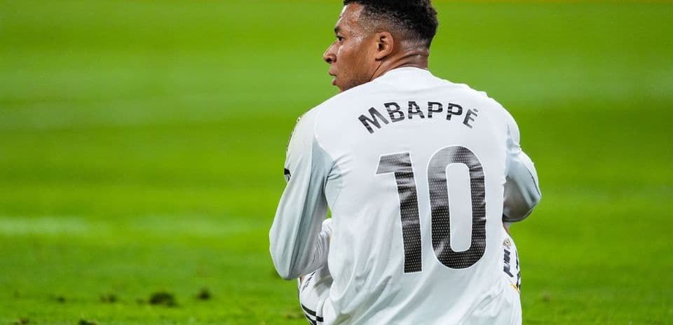 Player wearing jersey with 'MBAPPE' and number 10