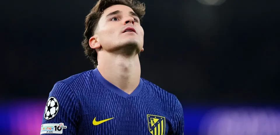Atletico Madrid player looking up during match