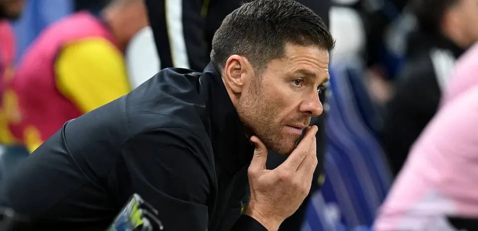 Coach observing the match from the sidelines