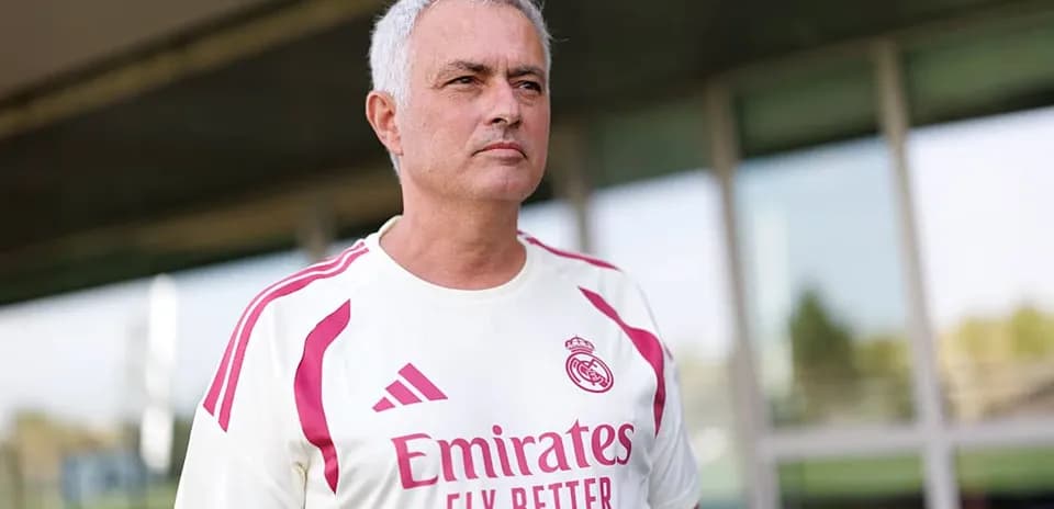 Coach in Real Madrid training kit at facility