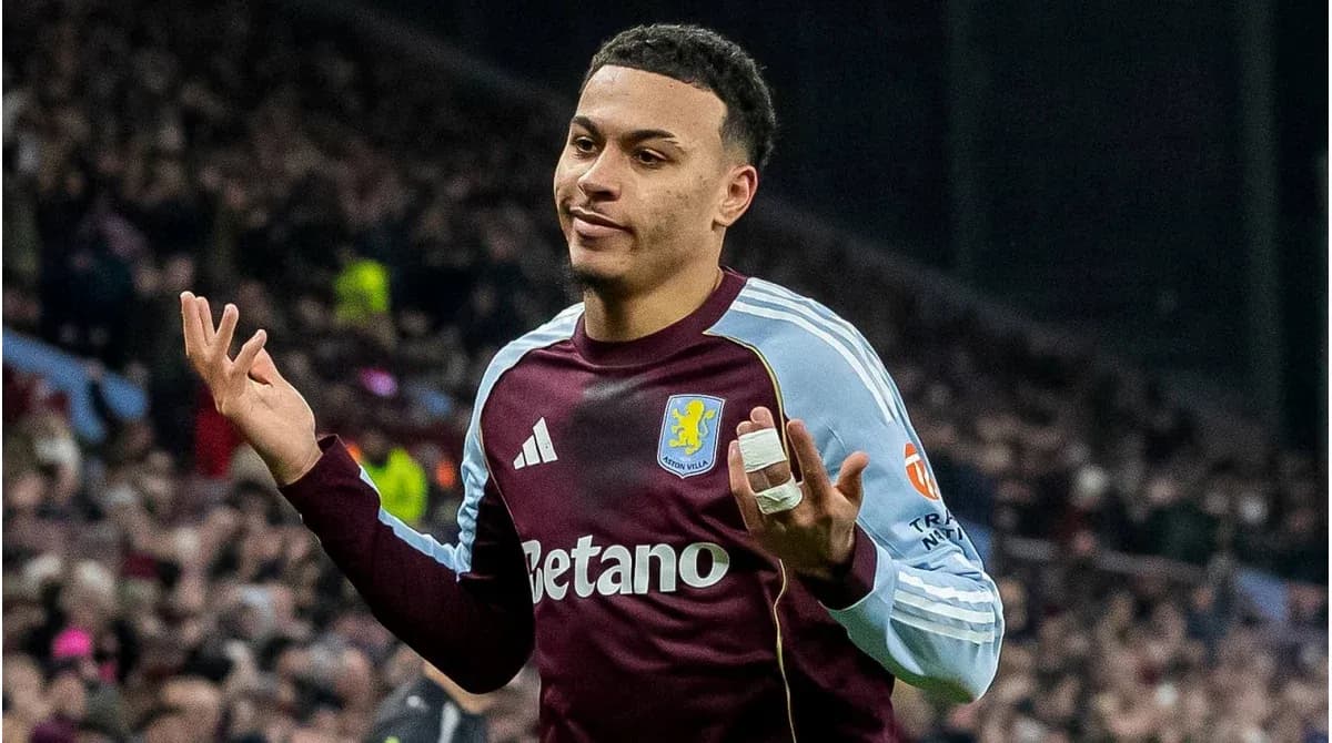 Player gesturing during match for Aston Villa