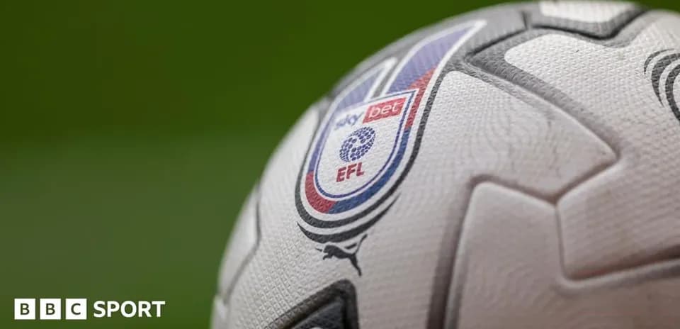 Close-up of a football featuring EFL logo