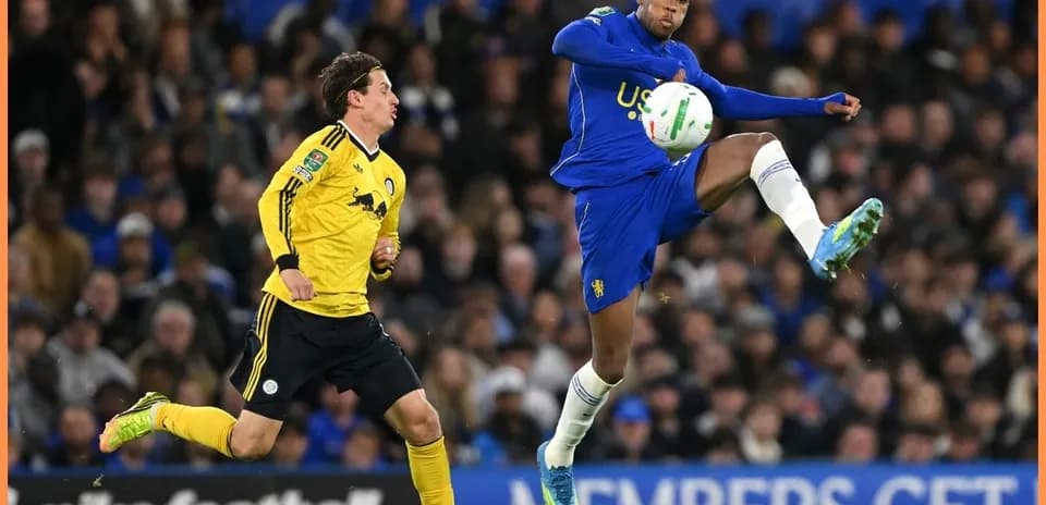 Player kicking the ball during a match