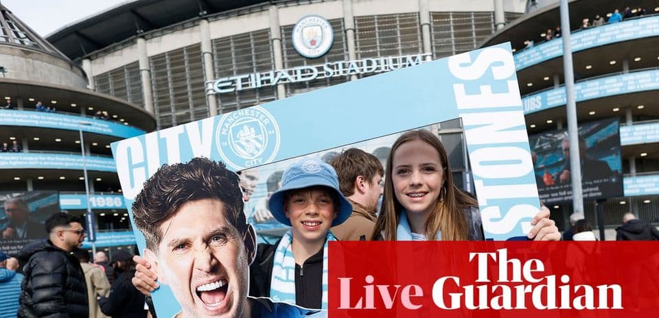 Fans holding sign outside Etihad Stadium before match