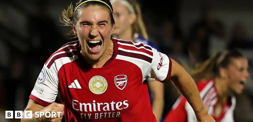Player celebrating a goal in Arsenal jersey