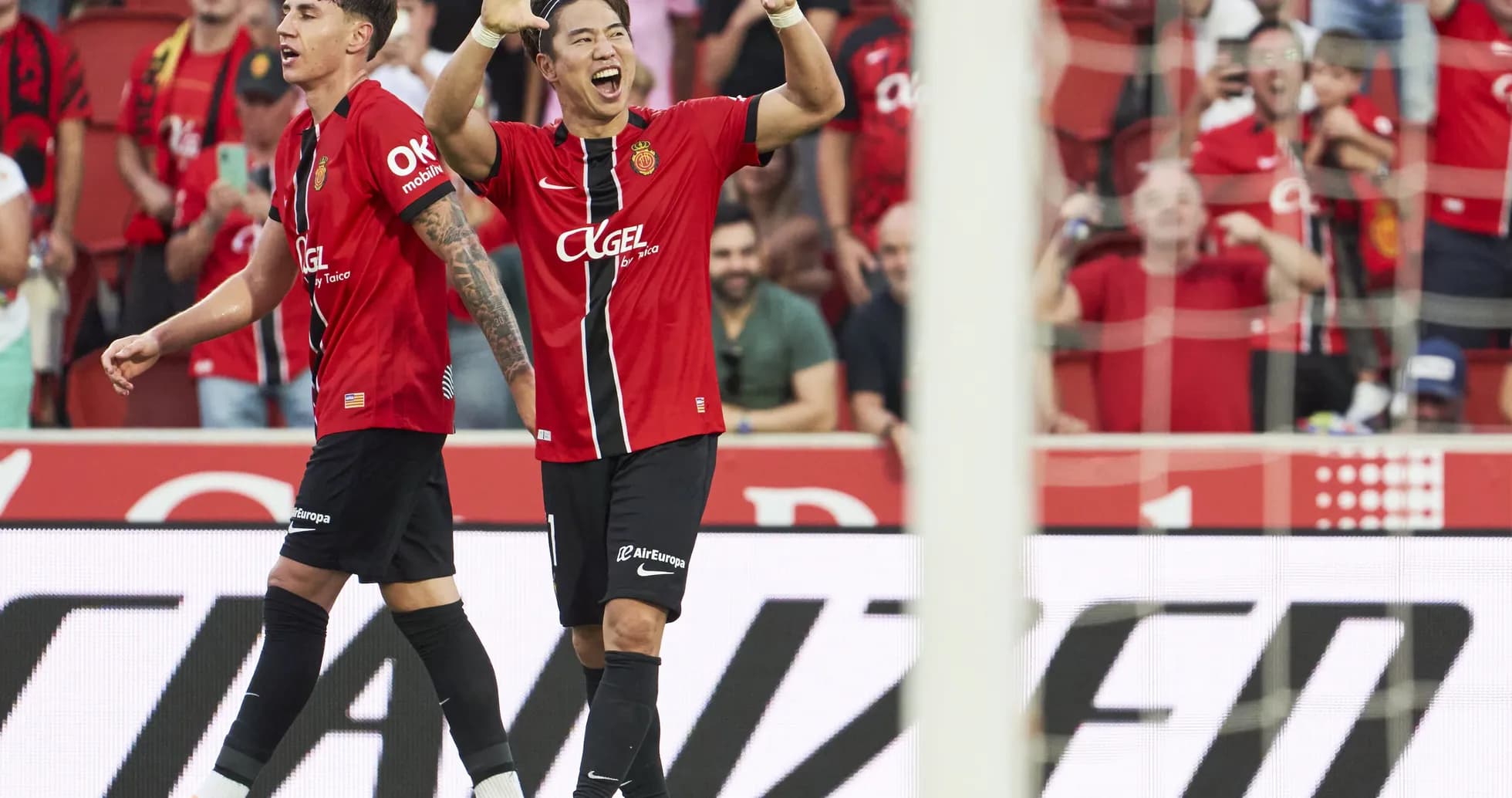 Mallorca players celebrating a goal during match