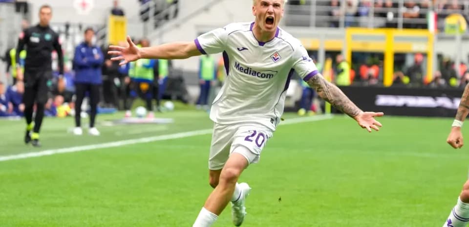 Fiorentina player celebrating a goal during match