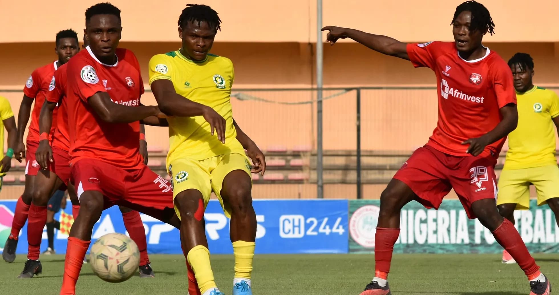 Enugu Rangers and Katsina United players in action