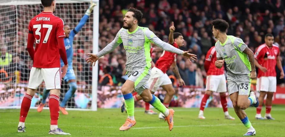 Manchester City player celebrating a goal