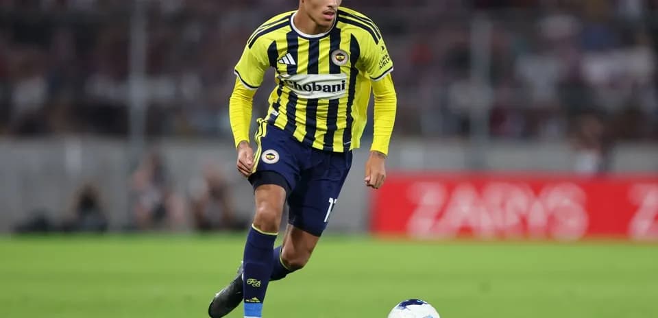 Fenerbahçe player dribbling during UEFA match