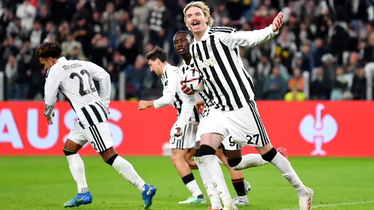 Juventus players celebrating a goal on the field Juventus players celebrating a goal on the field