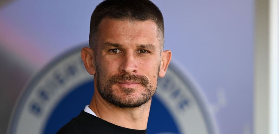 Player posing for a portrait at stadium