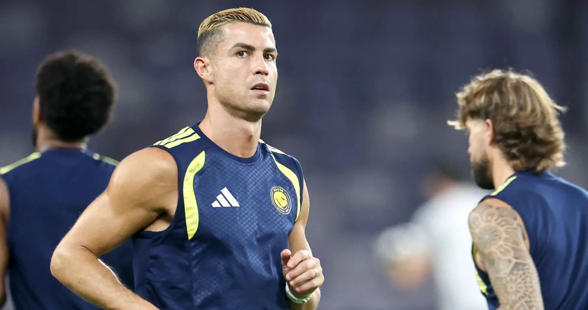 Player jogging during training session at stadium