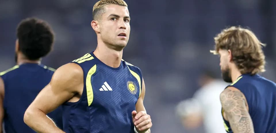Player jogging during training session at stadium