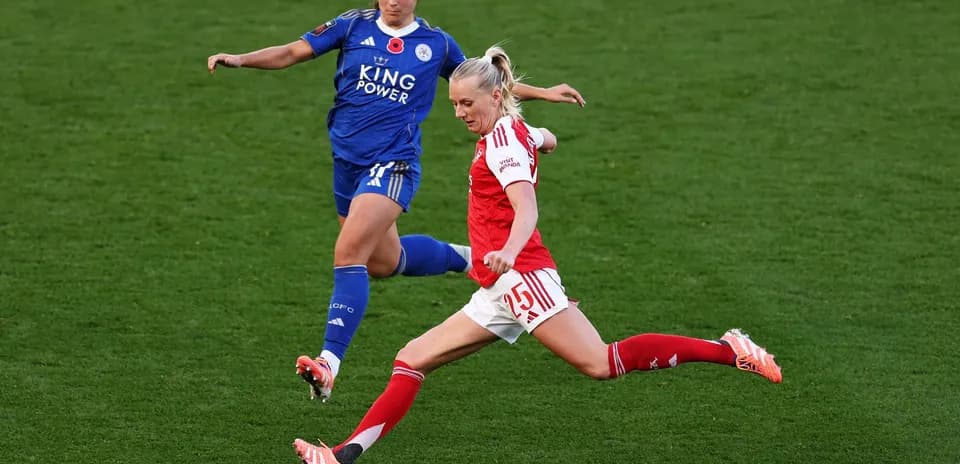 Arsenal player kicking the ball against Leicester City