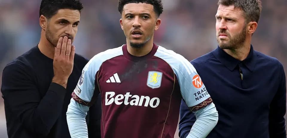 Coaches and player during match with Aston Villa kit