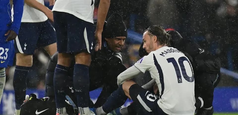 Player receiving medical attention on the pitch