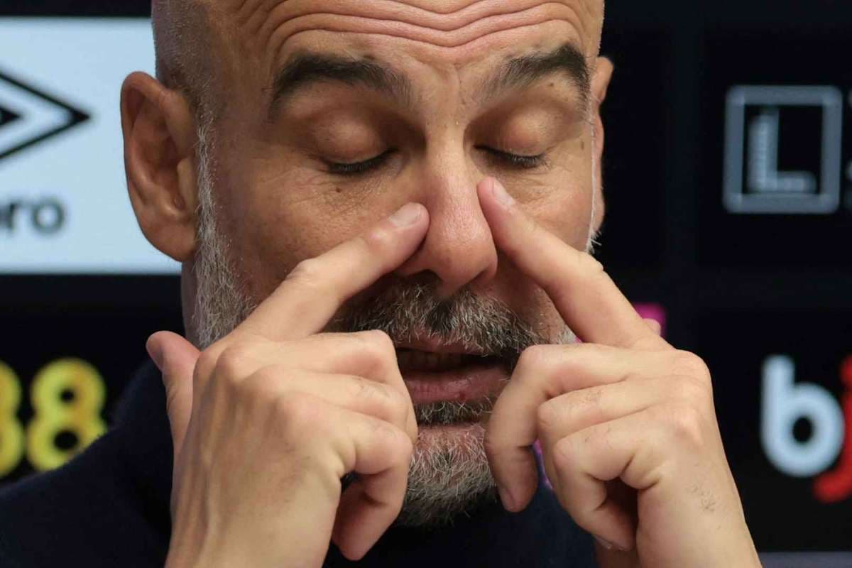 Man gesturing during a press conference