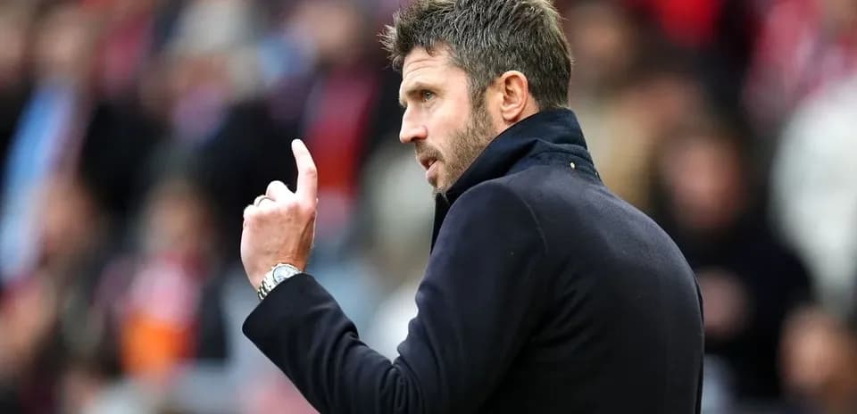 Coach giving instructions during a match