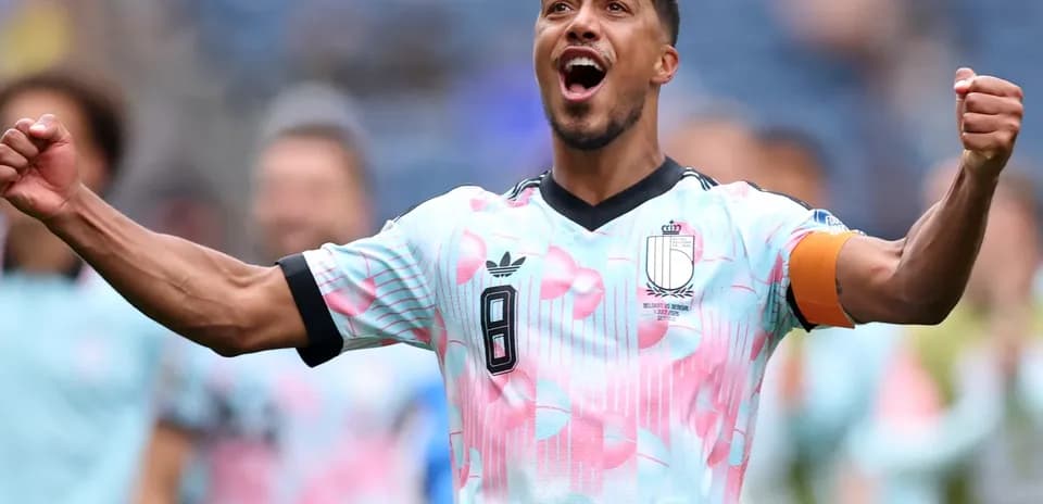 Player celebrating victory in Belgium jersey