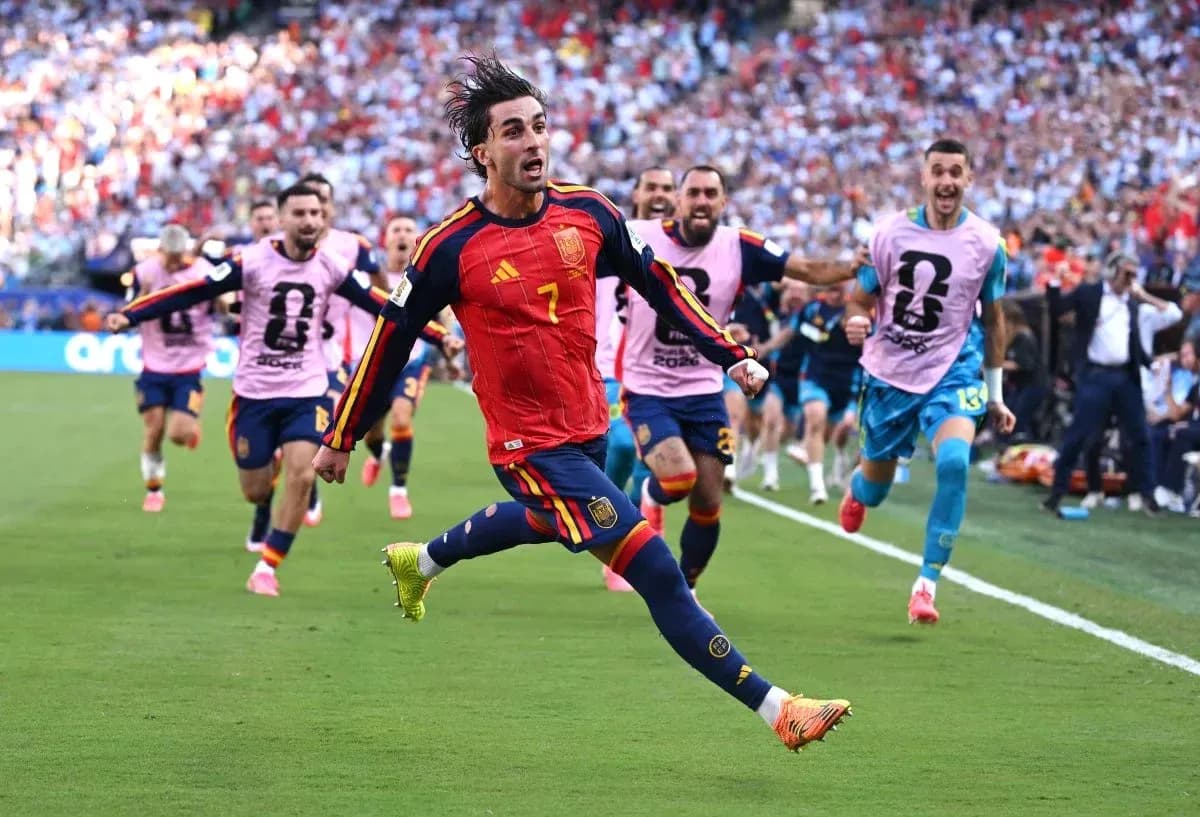 Player celebrating with teammates after scoring goal