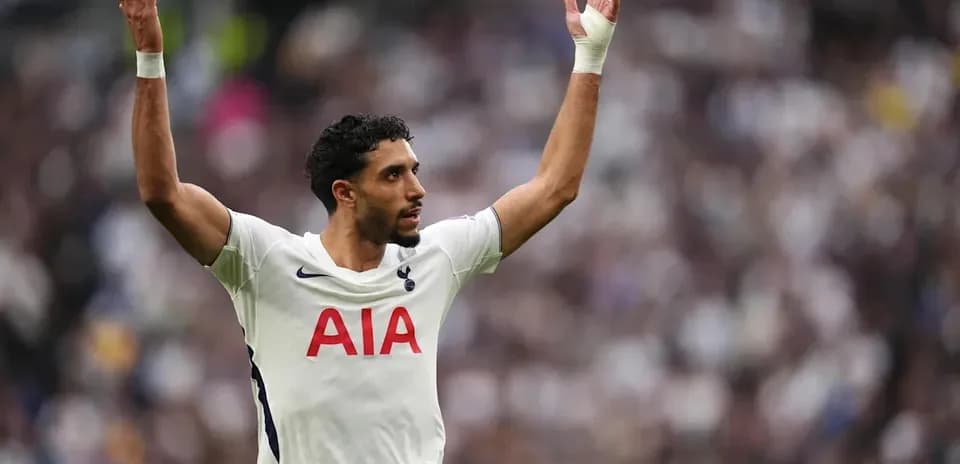 Player signaling during a match for Tottenham Hotspur