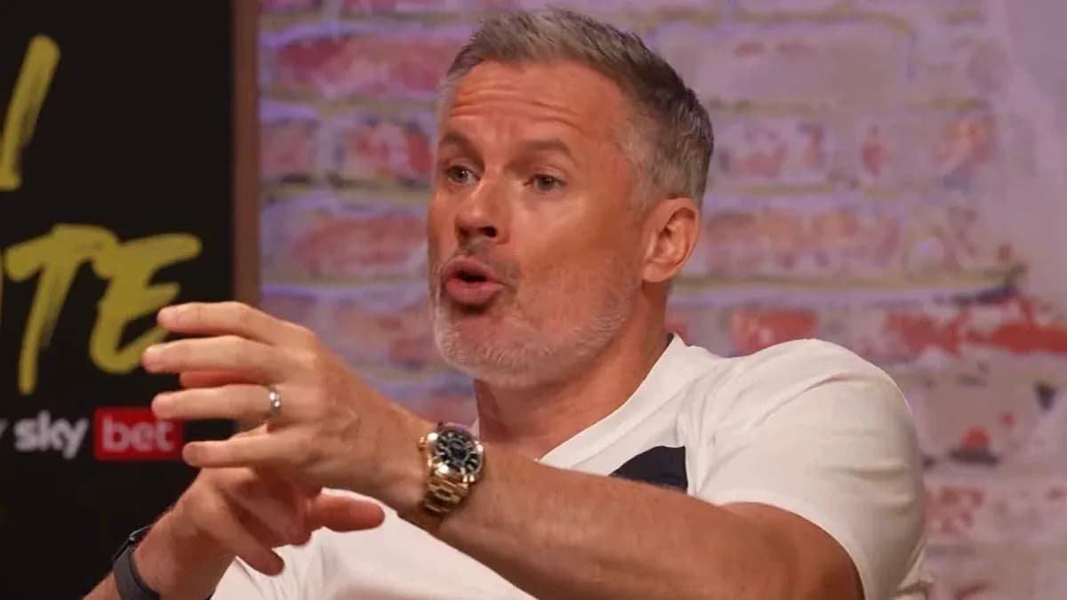 Man speaking animatedly in a studio setting