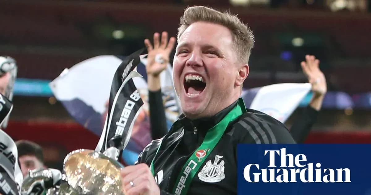 Manager celebrating with trophy after match victory