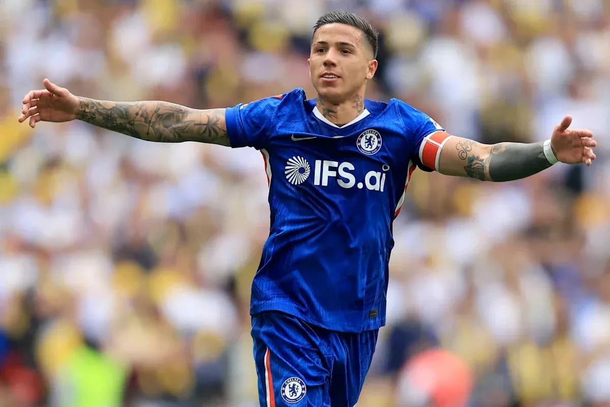 Player celebrating in Chelsea's blue kit on field