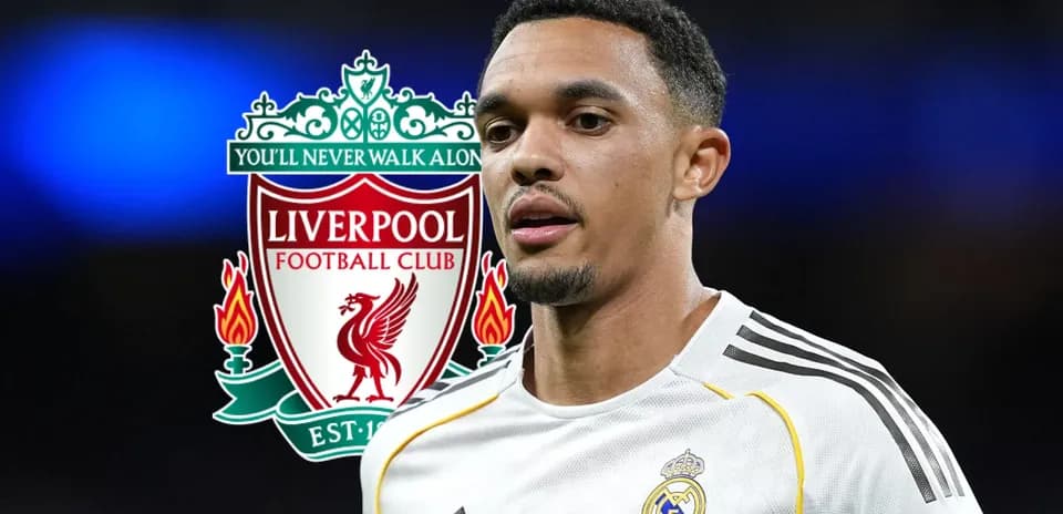 Player wearing Real Madrid kit with Liverpool logo in background