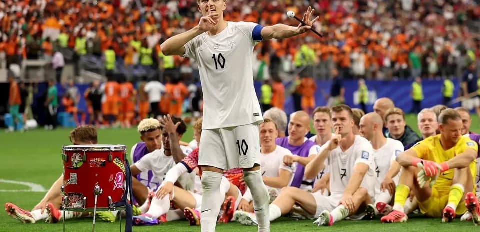 Player celebrating with teammates after match victory