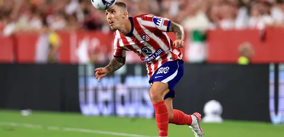 Player heading the ball during a match