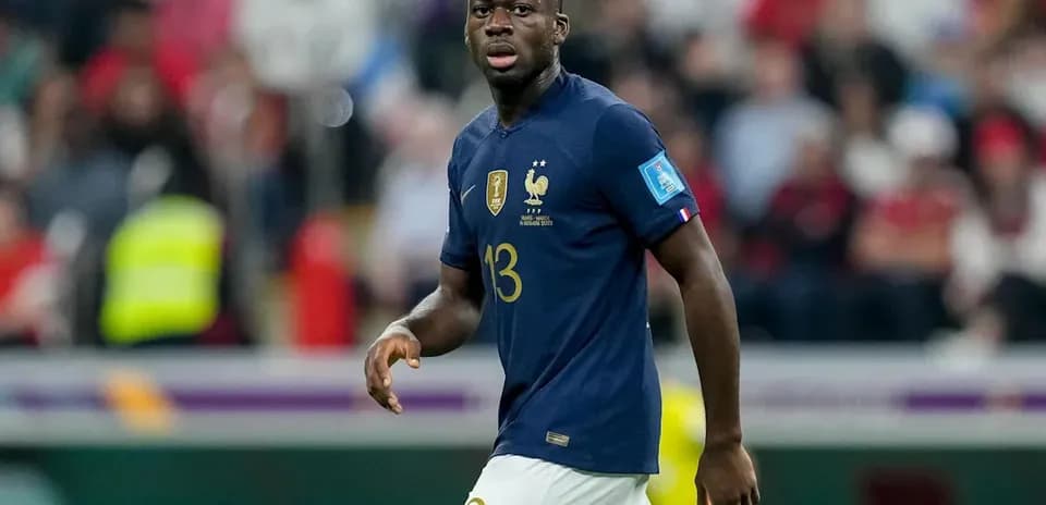 Player wearing France kit during match on field