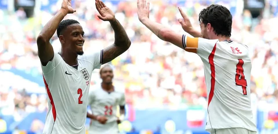 Players celebrating a goal during a match