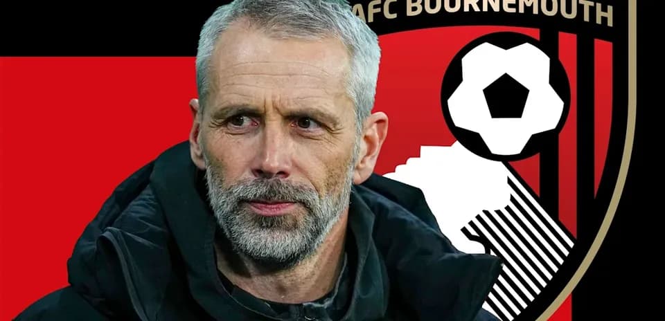 AFC Bournemouth manager with club logo background