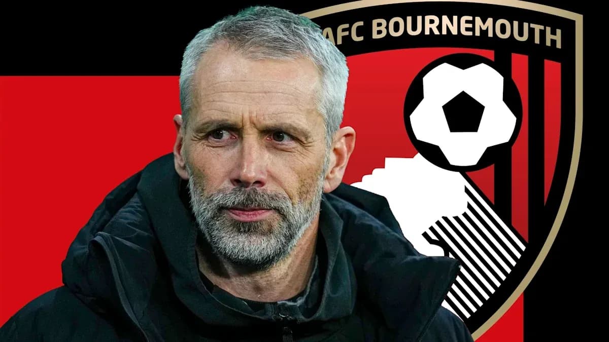 AFC Bournemouth manager with club logo background