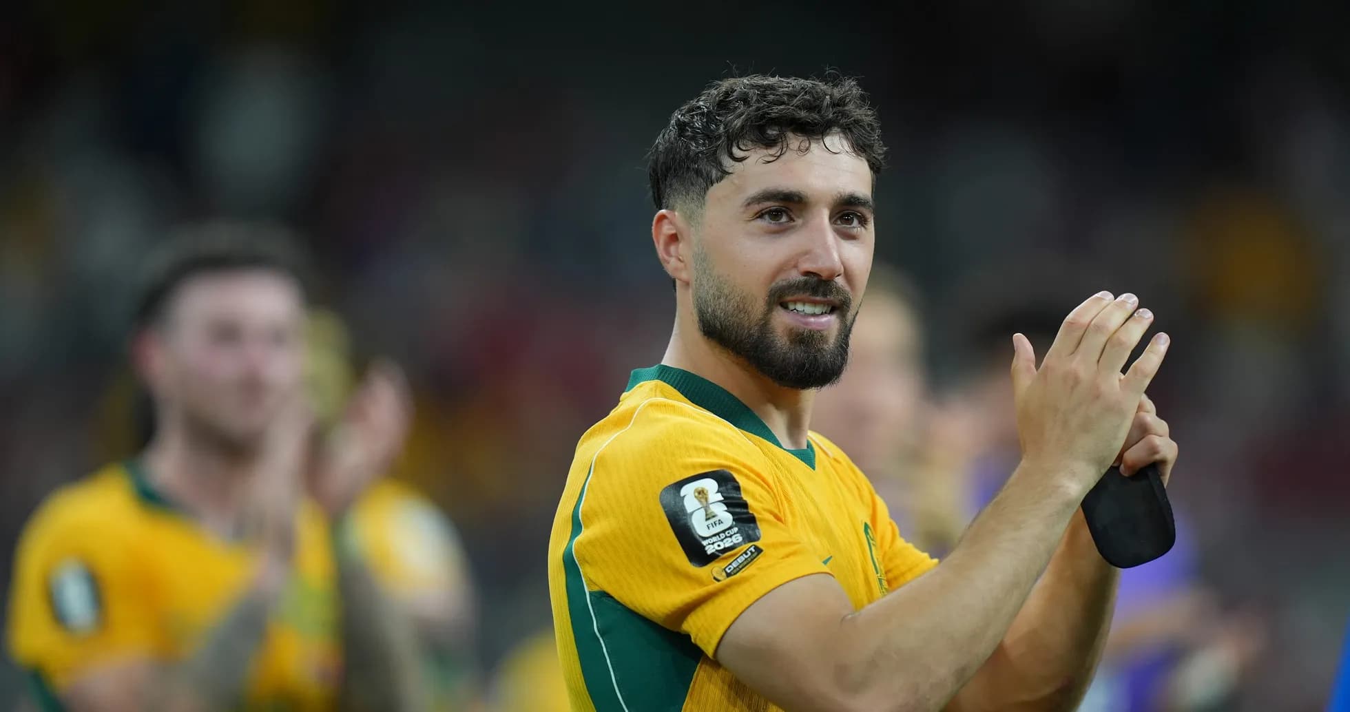 Player applauding fans after the match