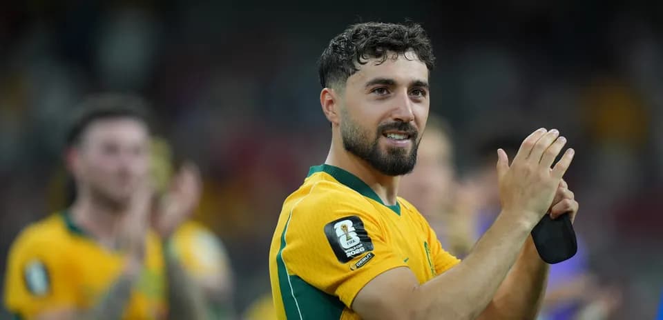 Player applauding fans after the match