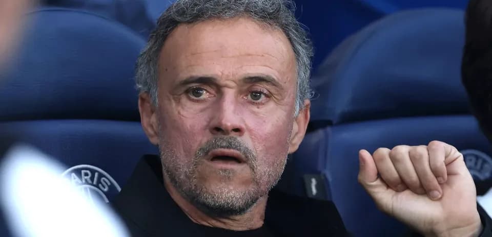 Coach observing the game from the bench