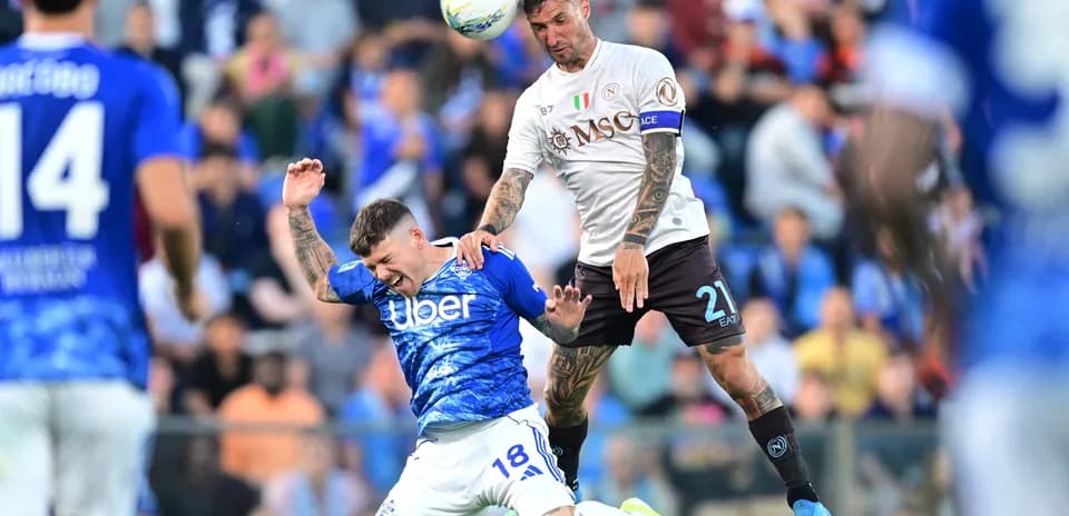 Player challenges for the ball during Napoli vs Como