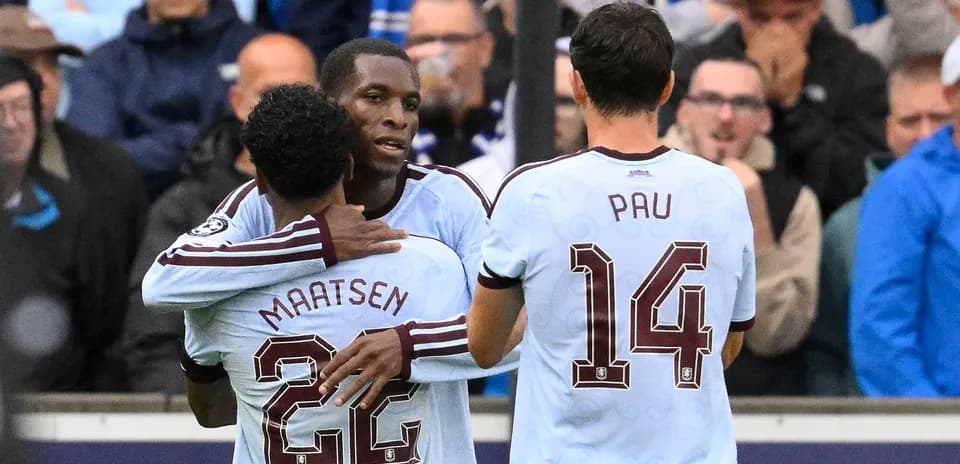 Players celebrating a goal during a match