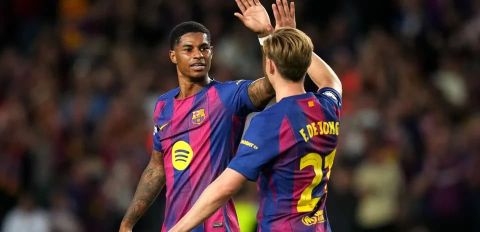 Barcelona players celebrating after a goal